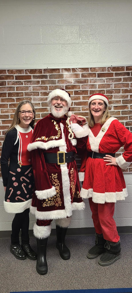 Santa, Mrs. Claus and Helper Elf