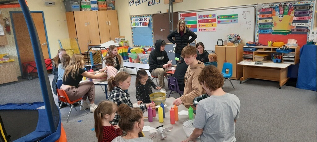 Leadership kids at preschool making spin art